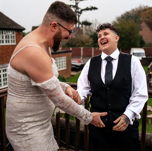Fake first look prank with a guest in a wedding dress at Toni and Vikki's vow renewal, Newtown House Hotel