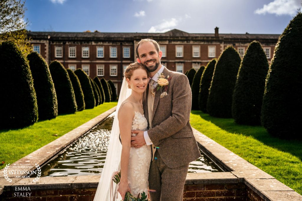 Bride and groom in the formal gardens at the Winchester Military Museums, Hampshire
