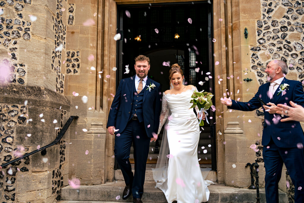 Daisy and Will on their wedding day at Winchester Register Office, Hampshire