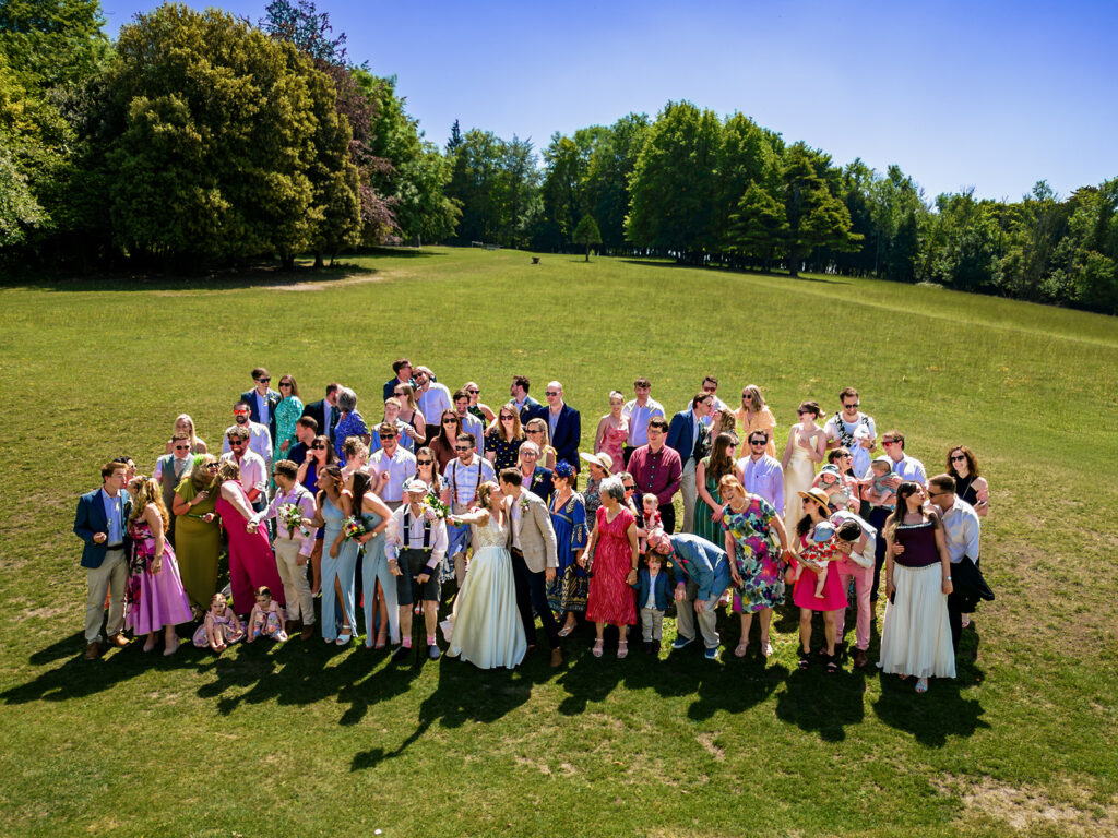 Drone shot at Great Ballard School outdoor ceremony Chichester 