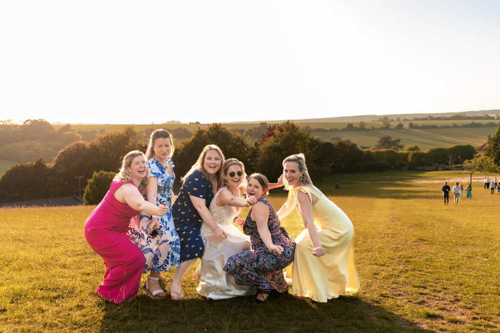 Fun group pictures taken over looking South Downs 