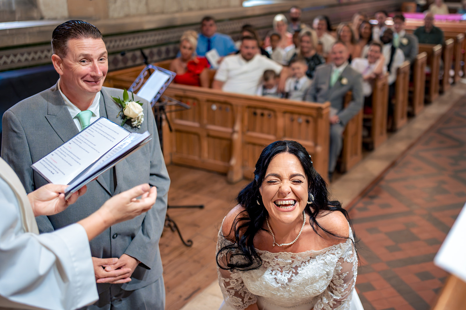 Joyful wedding ceremony at St Matthew's Church, Blackmoor near Liss