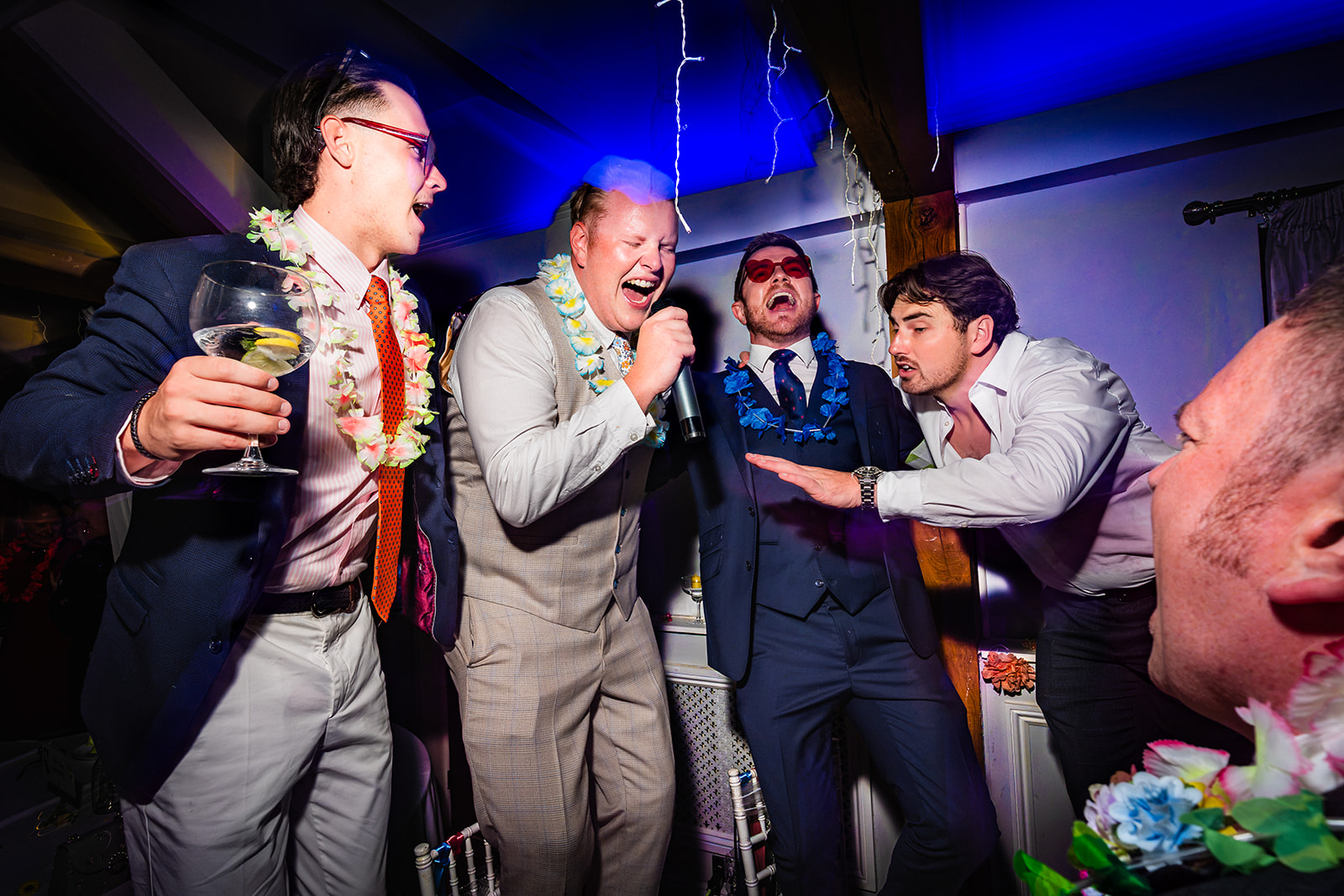 Guests singing and celebrating on the dancefloor at Newtown House Hotel