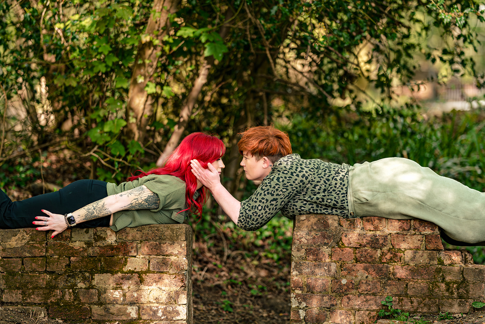 Dramatic reclining pose at an 80s themed engagement shoot