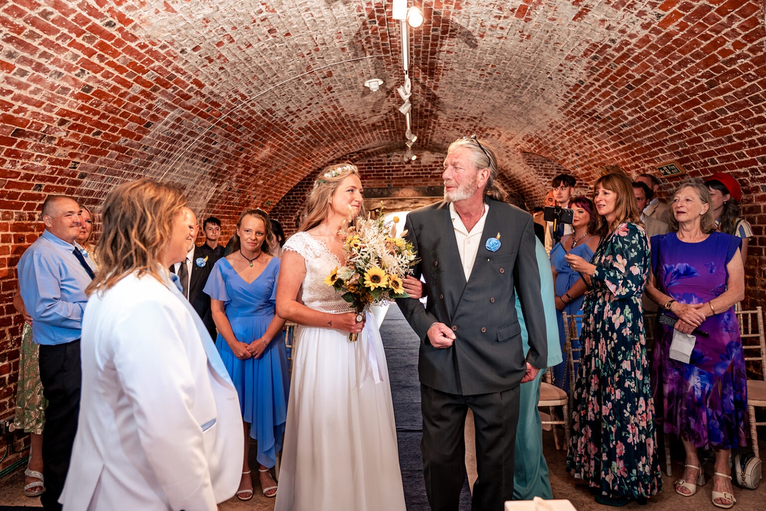Wedding ceremony under the brick archway inside Southsea Castle, Portsmouth