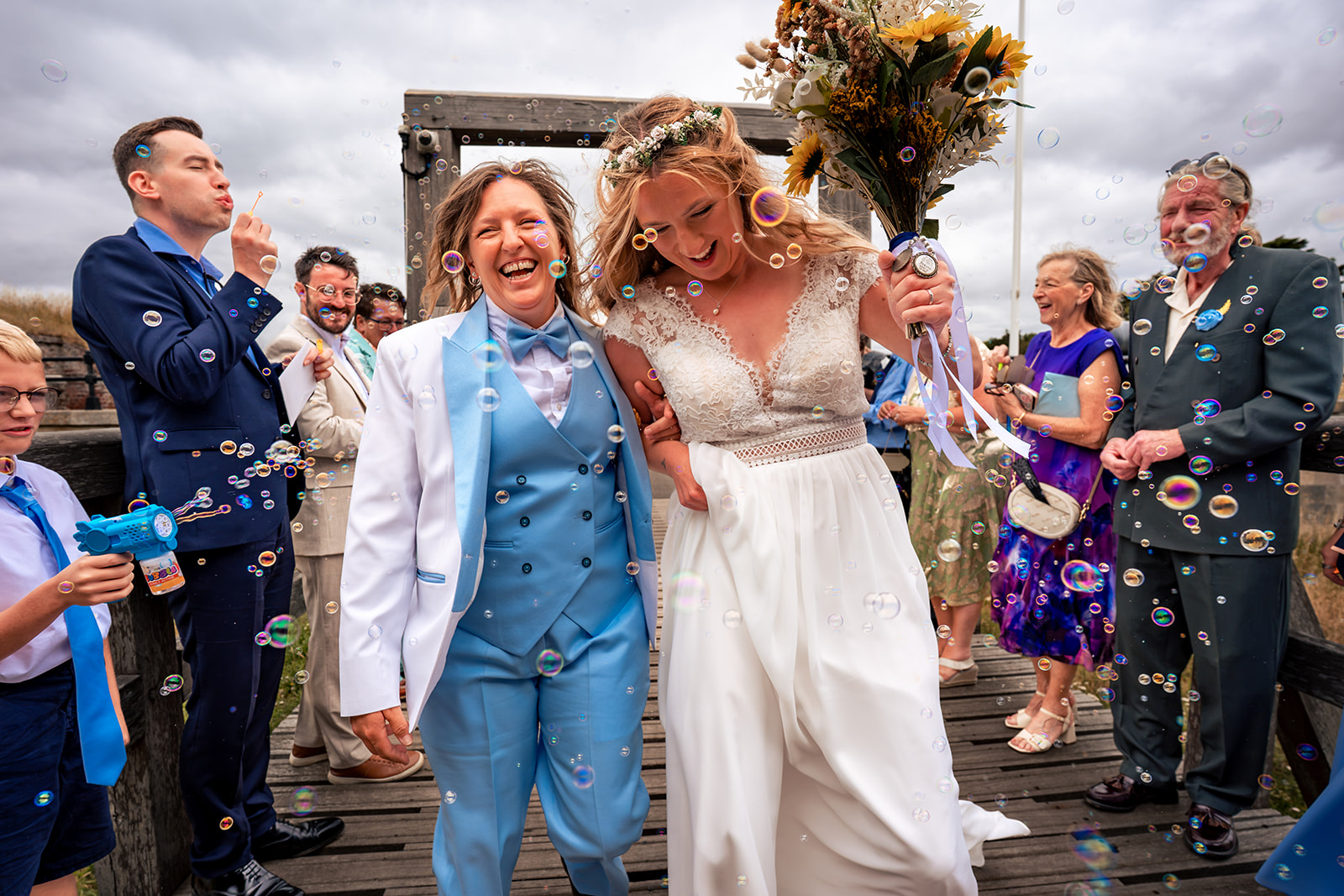 Confetti as two brides leave their Southsea Castle wedding ceremony