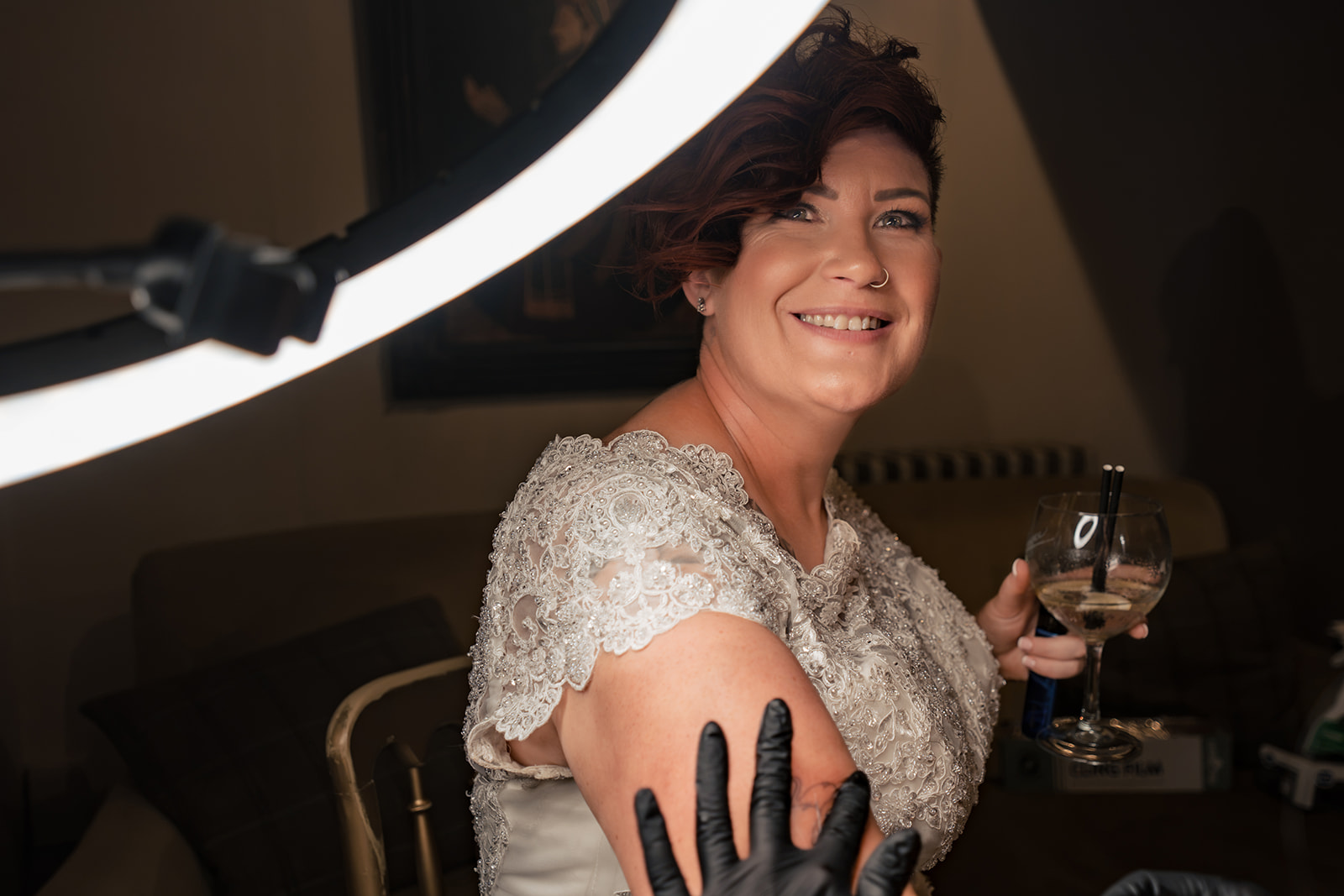 Bride with a cocktail during the reception at The Elephant at Pangbourne, Berkshire