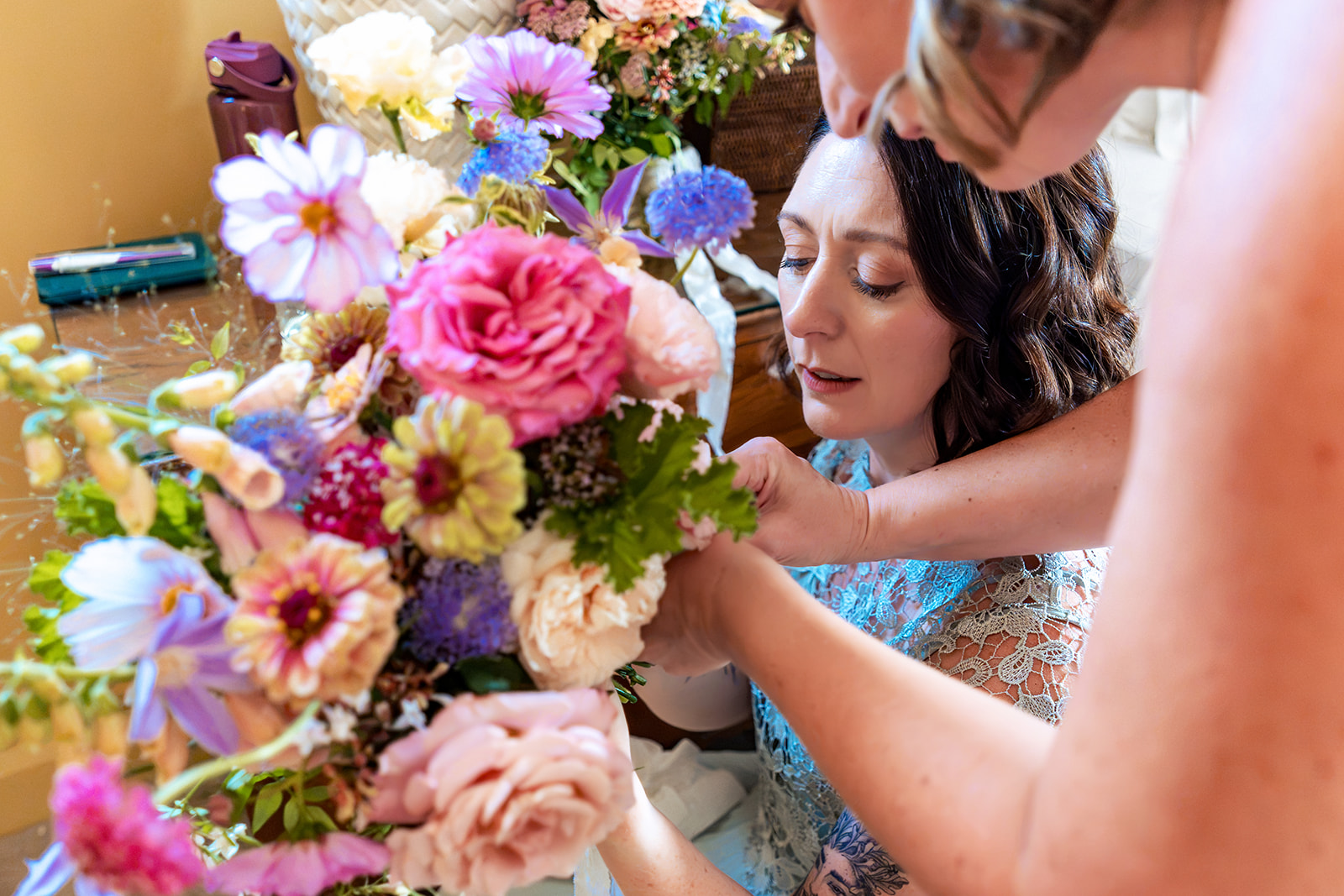 Bride with her bouquet by Jessie Anderson Studio before her Beaulieu wedding