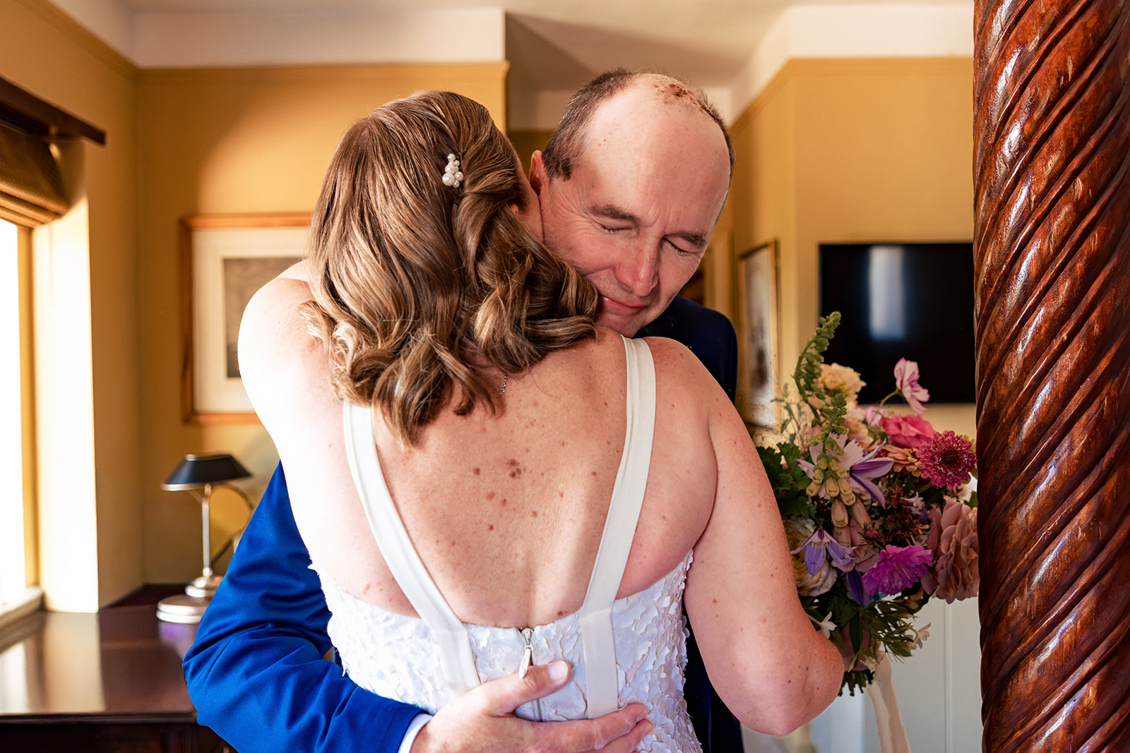 Bride and groom share their first look before their Beaulieu River wedding