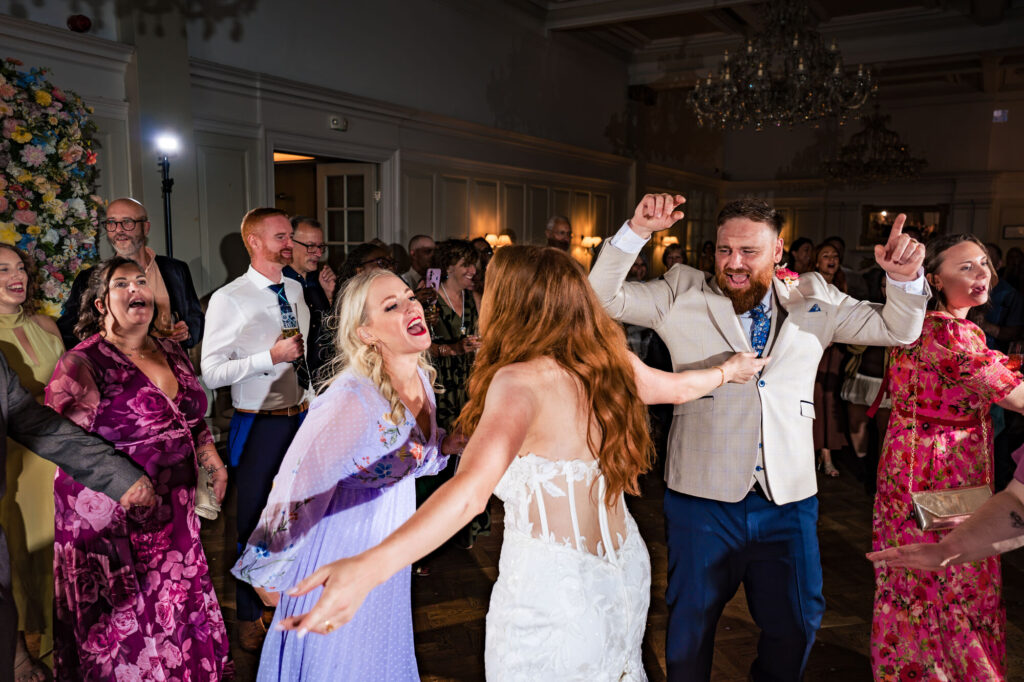 Flash-lit evening reception dancefloor at The Queens Hotel Southsea