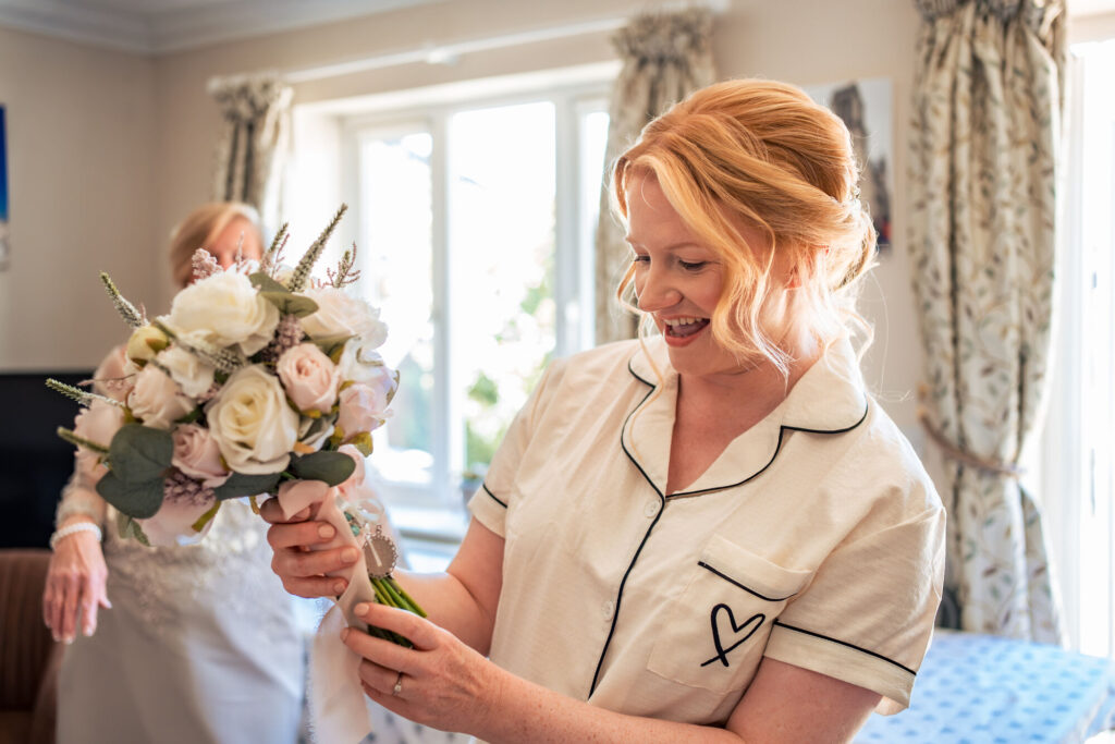 Bride holding her bouquet during bridal prep before her Square Tower Old Portsmouth wedding