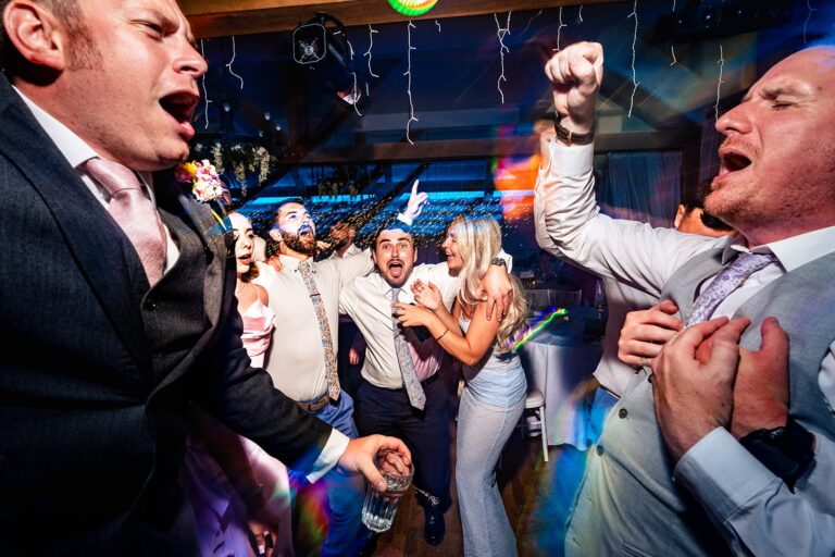 Guests screaming and celebrating on the dancefloor at Newtown House Hotel, Hayling Island