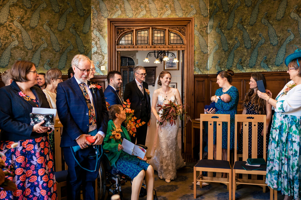 Wedding ceremony in the wood panelled room at Winchester Register Office, Hampshire