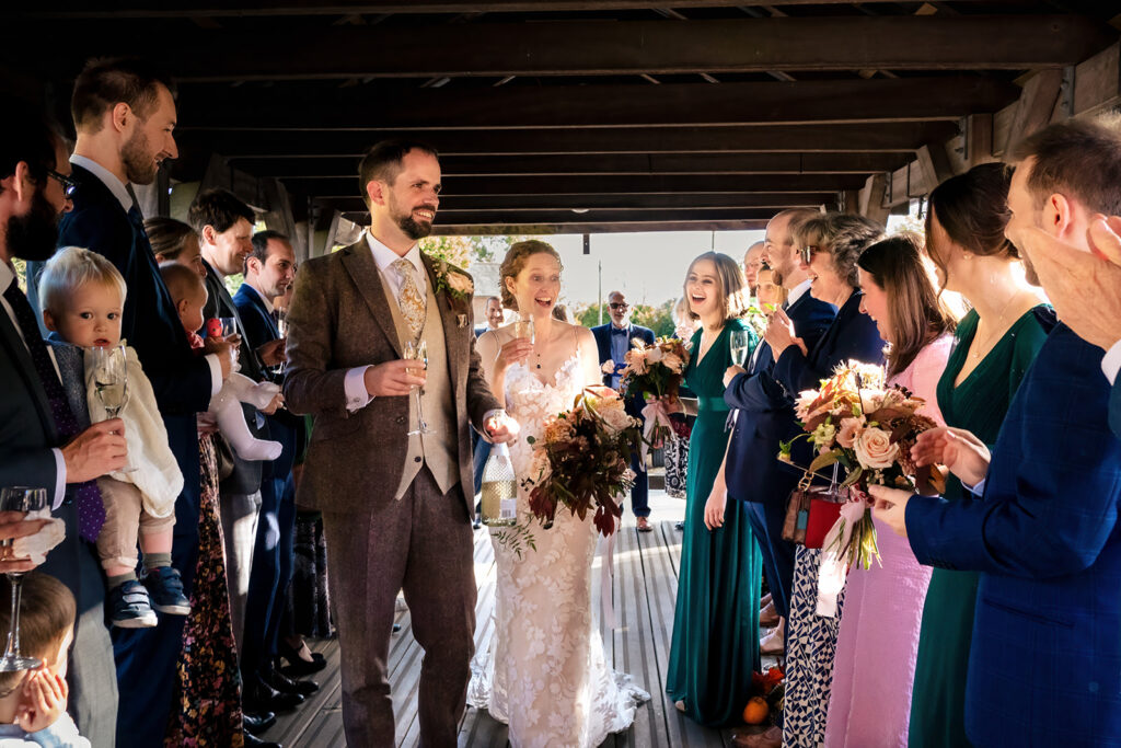 Guests gathered in the barn at Kimbridge Barn, Test Valley, Hampshire