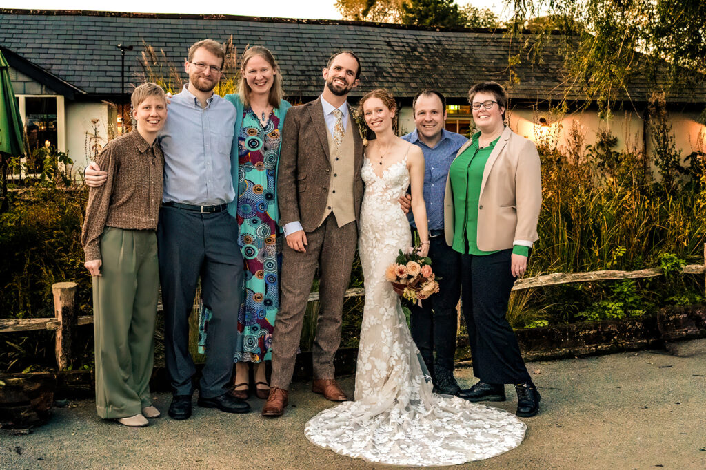 Family group photo outside the barn at Kimbridge Barn, Test Valley, Hampshire
