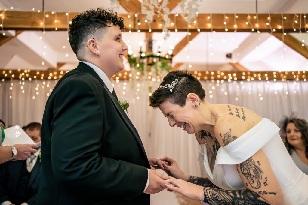 Two brides exchanging vows at Newtown House Hotel, Hayling Island