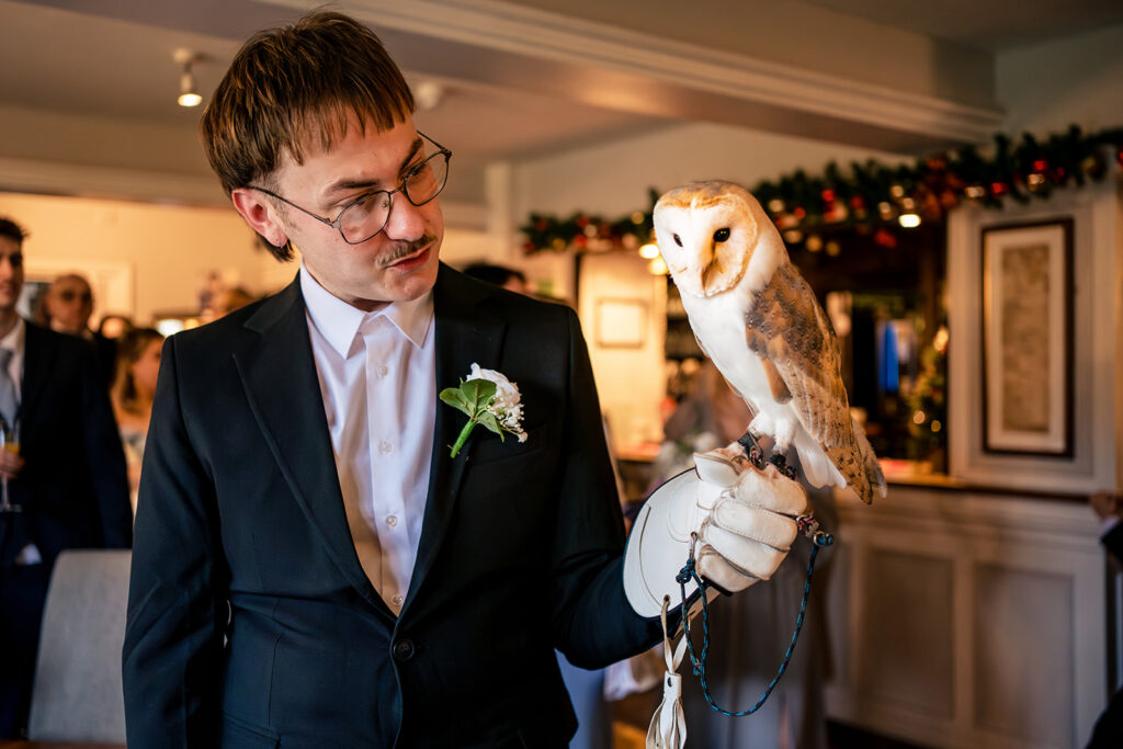 Owl delivering the rings at a vow renewal at Newtown House Hotel, Hayling Island