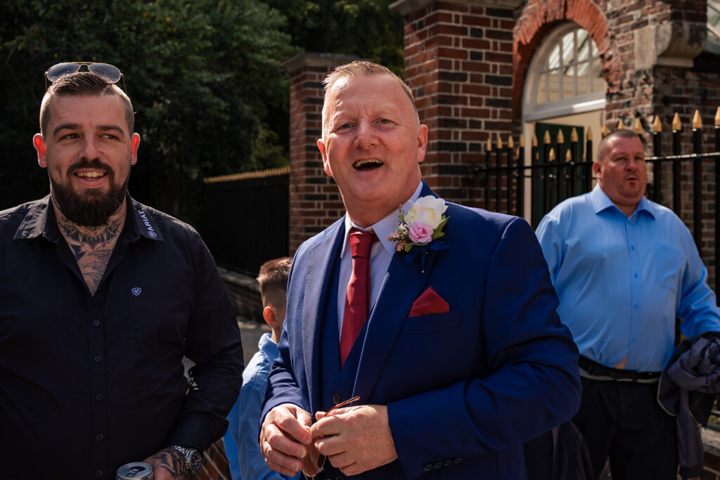 Groom arriving with guests at Portsmouth Register Office, Hampshire