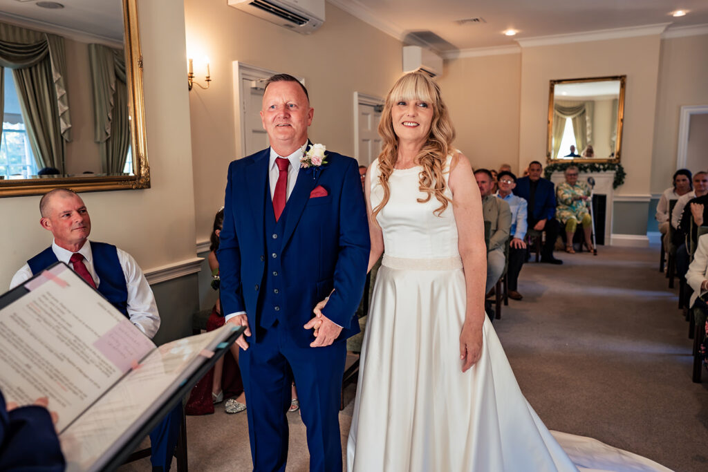 Bride and groom at the front of the ceremony room at Portsmouth Register Office, Hampshire