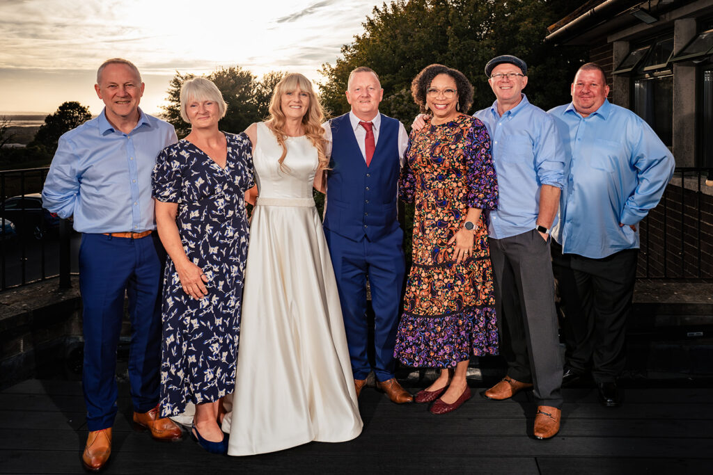 Family group photo with views over Portsmouth at The Churchillian, Portsdown Hill, Portsmouth