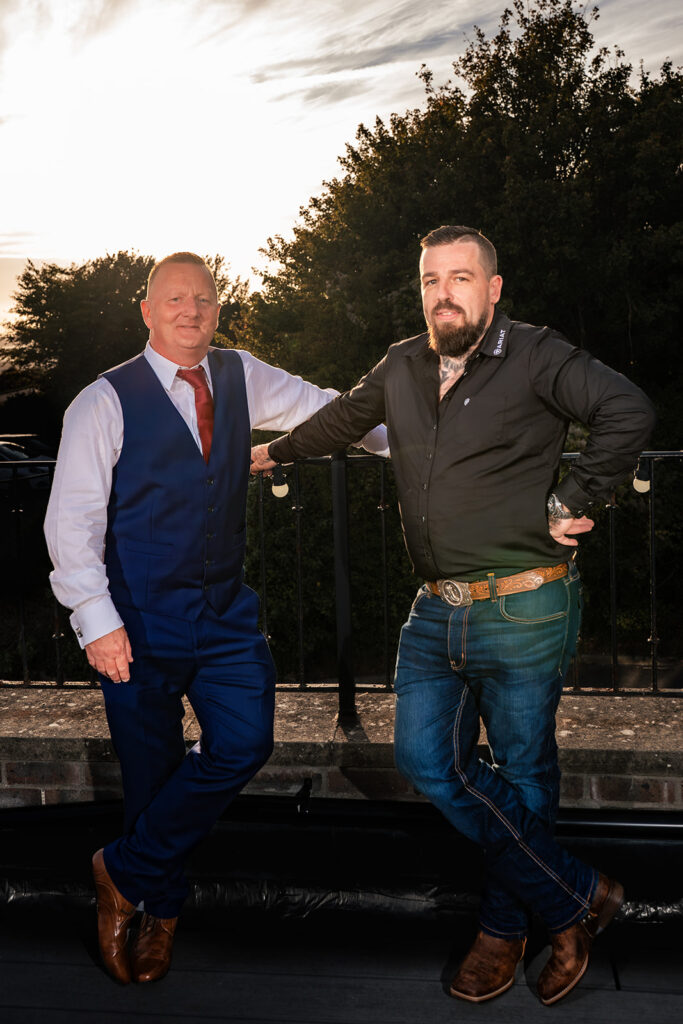 Groom with a guest on the terrace at The Churchillian, Portsdown Hill, Portsmouth