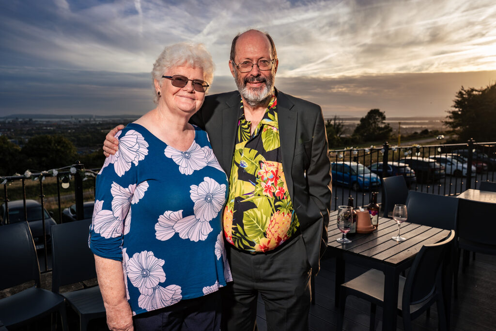 Older guests on the terrace overlooking Portsmouth at The Churchillian, Portsdown Hill, Portsmouth