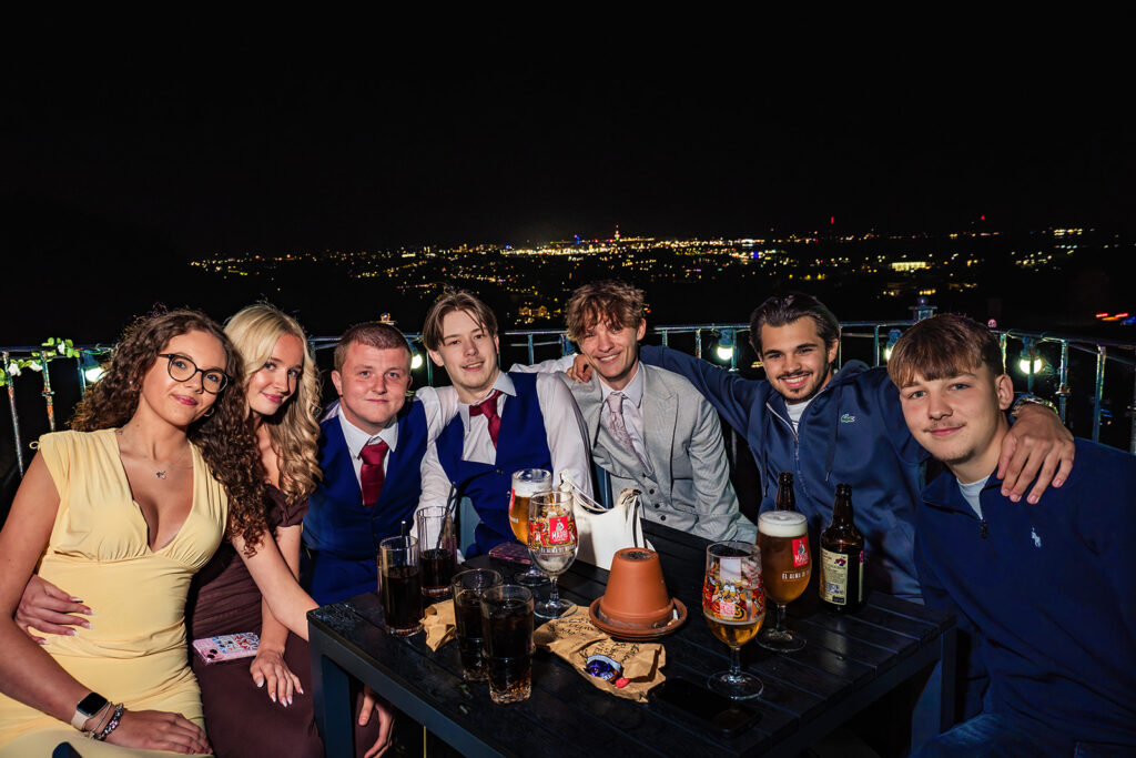 Guests at the evening reception with Portsmouth lit up below at The Churchillian, Portsdown Hill, Portsmouth