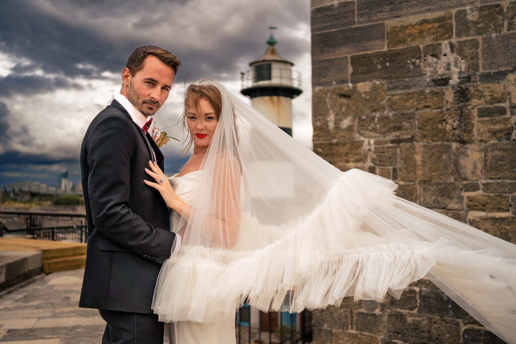 Veil blowing in the wind at Southsea Castle, Portsmouth (styled shoot)
