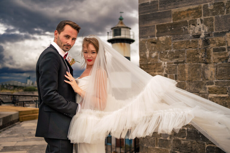 Veil blowing in the wind at Southsea Castle, Portsmouth (styled shoot)