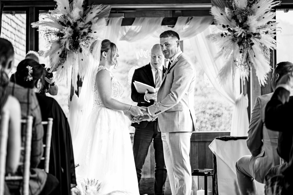 Ceremony moment, black and white at Old Thorns Hotel and Resort, Liphook