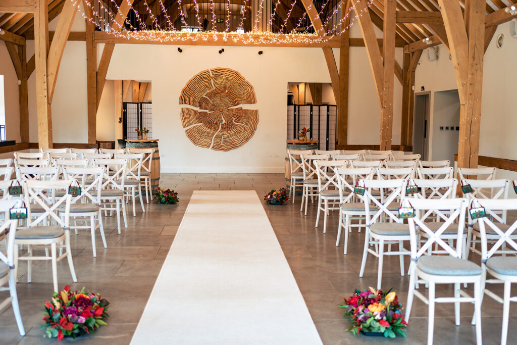 Ceremony set up in the oak barn at The Post Barn, Newbury