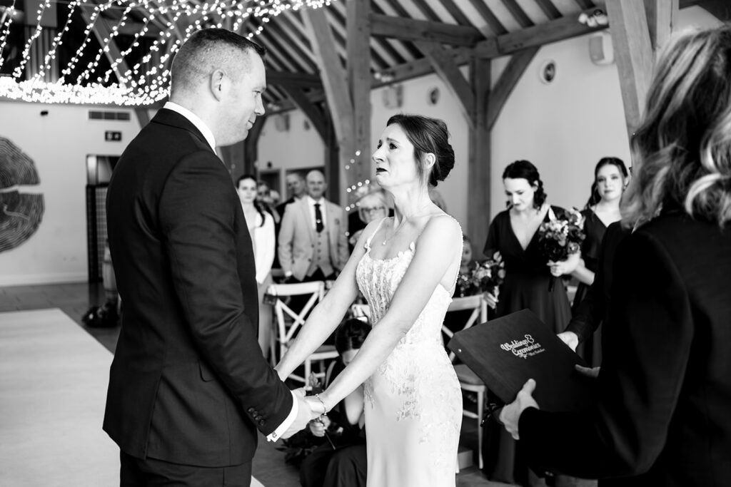 Vows in the barn, black and white at The Post Barn, Newbury