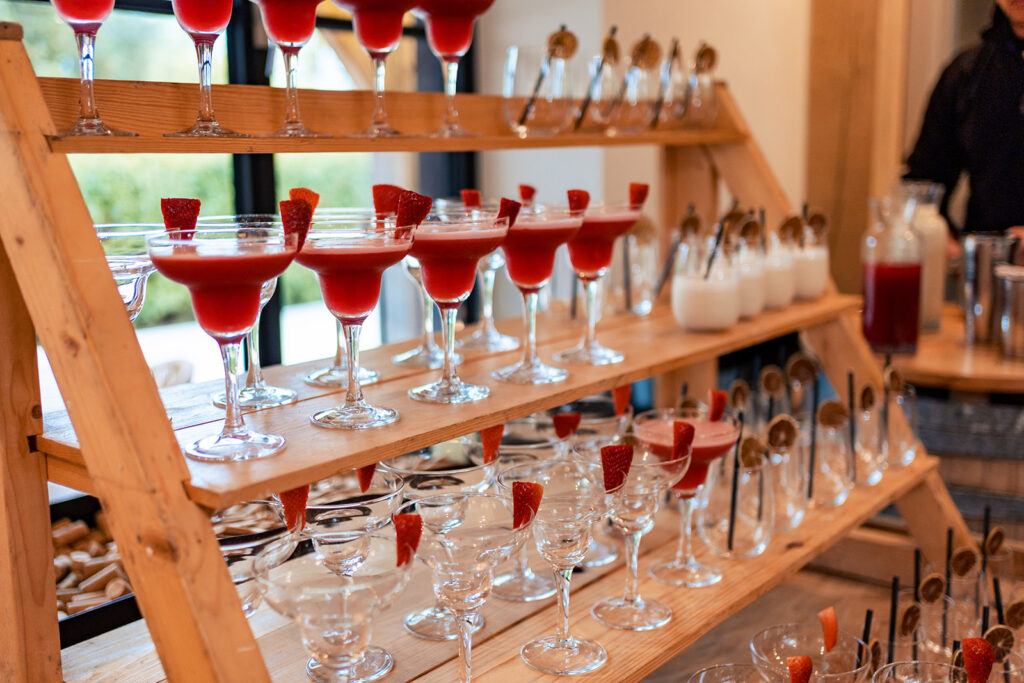 Wall of drinks at the reception at The Post Barn, Newbury