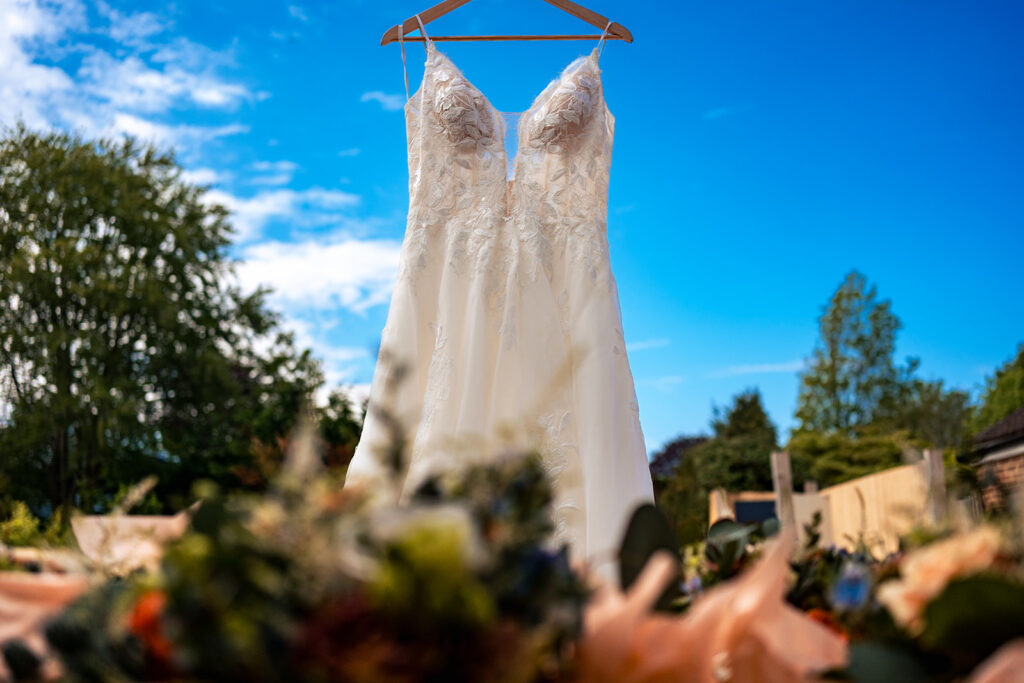 Wedding dress hanging in the sunshine at Royal Military Academy Sandhurst