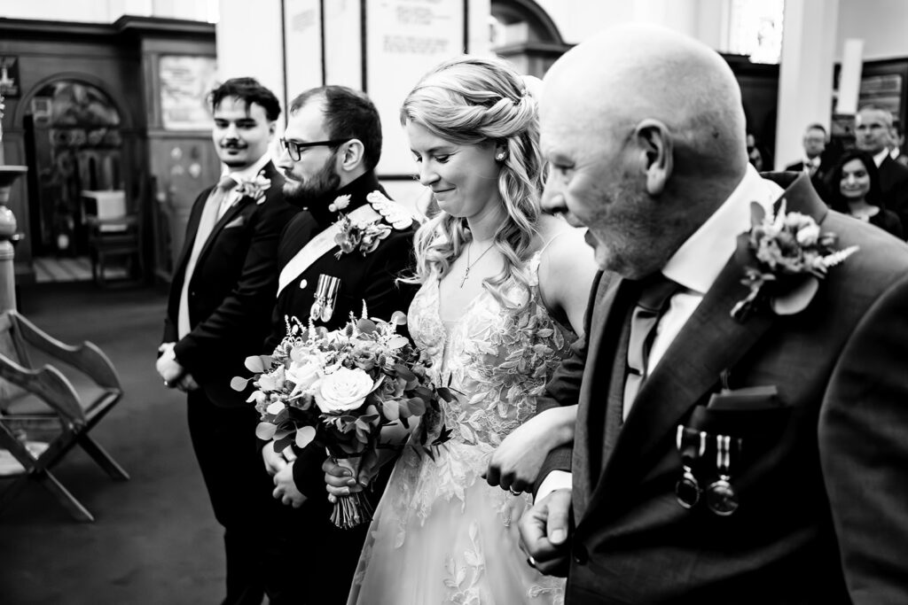 Moment in the chapel, black and white at Royal Military Academy Sandhurst