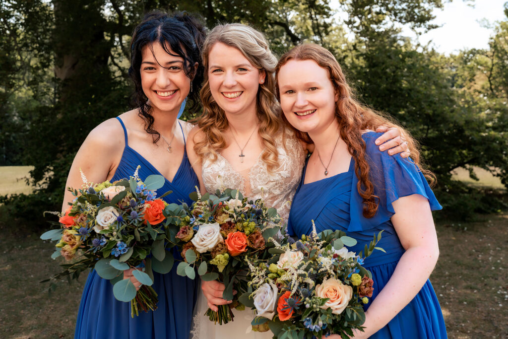 Bride with her bridesmaids in navy at Royal Military Academy Sandhurst