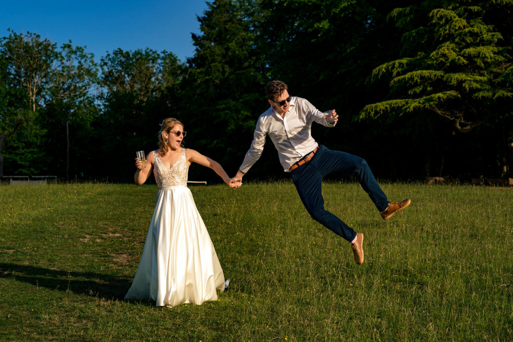Groom leaping across the lawn at Great Ballard School, Eartham