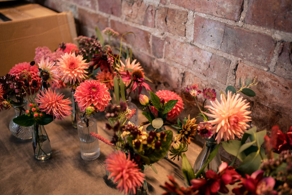 Coral and pink flower arrangement at Dorfold Hall, Cheshire