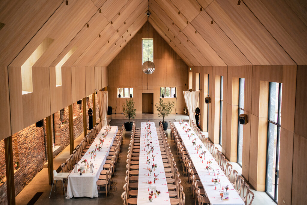 Long tables in the barn at Dorfold Hall, Cheshire