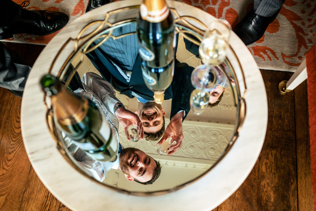 Couple reflected in a silver bowl at Dorfold Hall, Cheshire