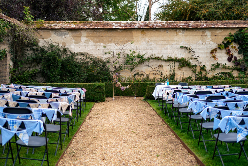 Ceremony set up in the walled garden at Houghton Lodge Gardens, Hampshire