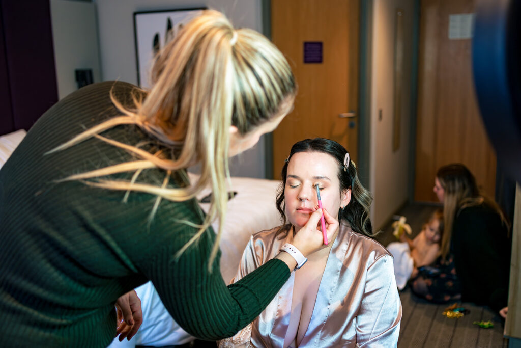 Bride having her make up done at Skylark Golf and Country Club, Whiteley