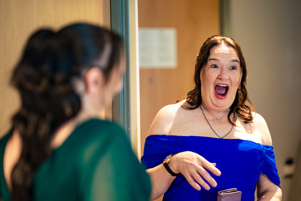 Bridesmaid laughing during getting ready at Skylark Golf and Country Club, Whiteley