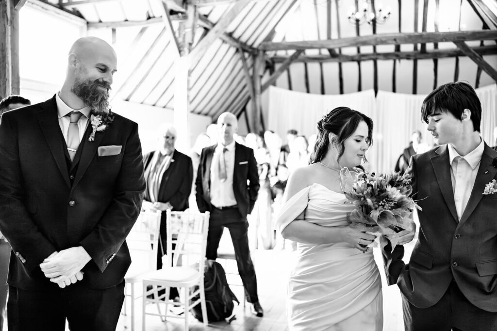 Bride arriving at the ceremony, black and white at Skylark Golf and Country Club, Whiteley