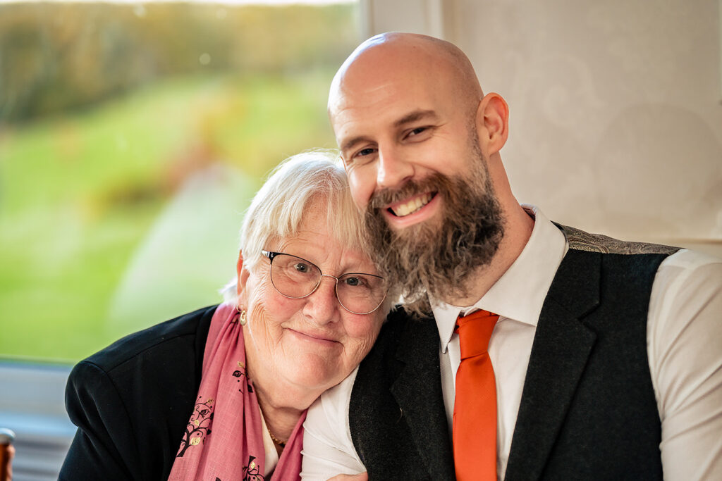 Groom laughing with a guest at Skylark Golf and Country Club, Whiteley
