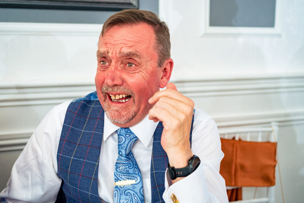 Groom laughing during the speeches at Skylark Golf and Country Club, Whiteley