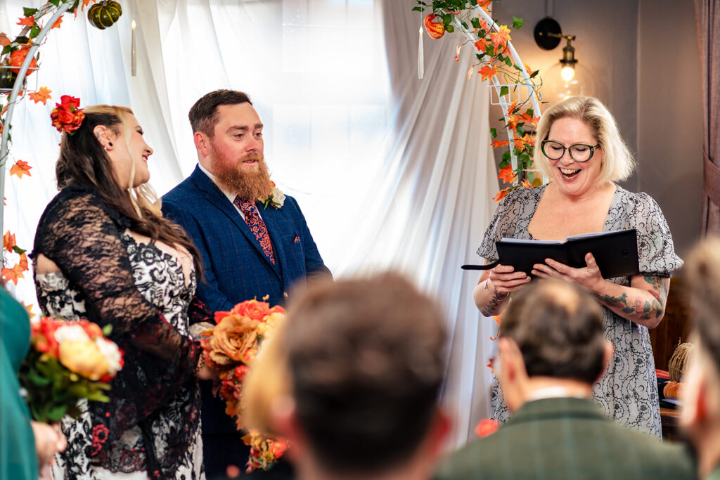 Ceremony in the pub function room at Halloween micro wedding, Southampton