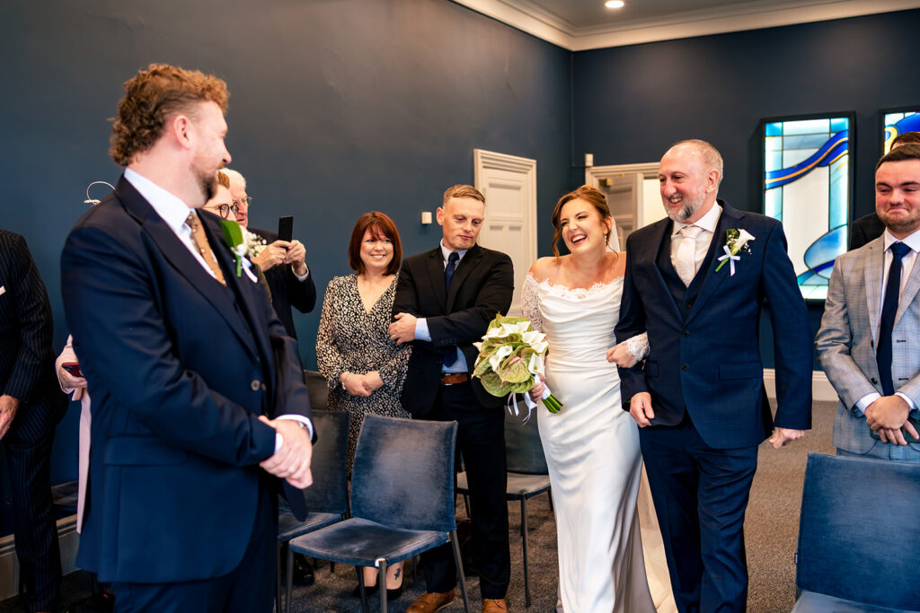 Bride arriving into the ceremony room at Winchester Register Office