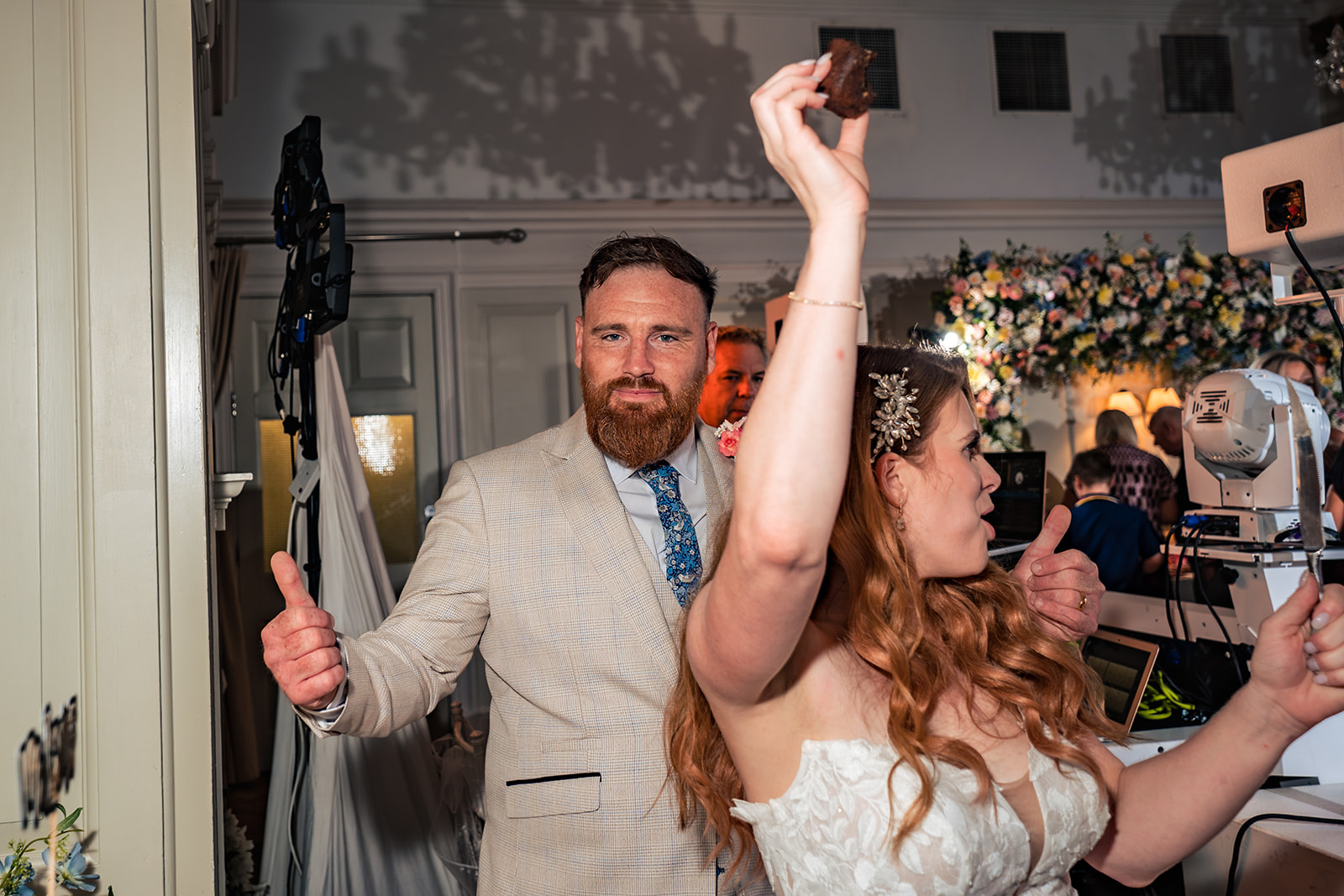 Bride throwing her arm in the air as the evening party kicks off at The Queens Hotel Southsea