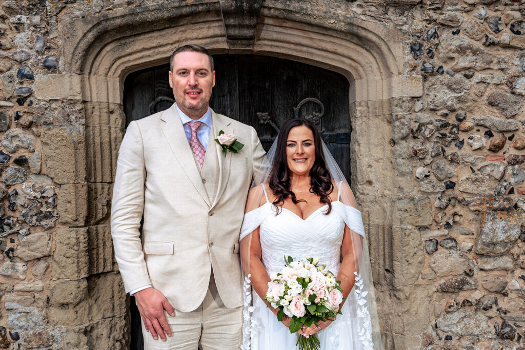 Sally and Dave at the church door at St Thomas à Becket Church, Warblington